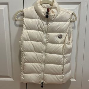 Authentic Worn moncler big kids vest with make up stains at collar